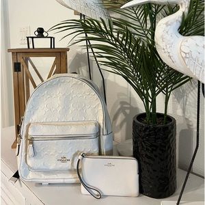 Signature leather coach backpack and zipper pouch